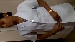 Tamil nurse remove cloths for patients